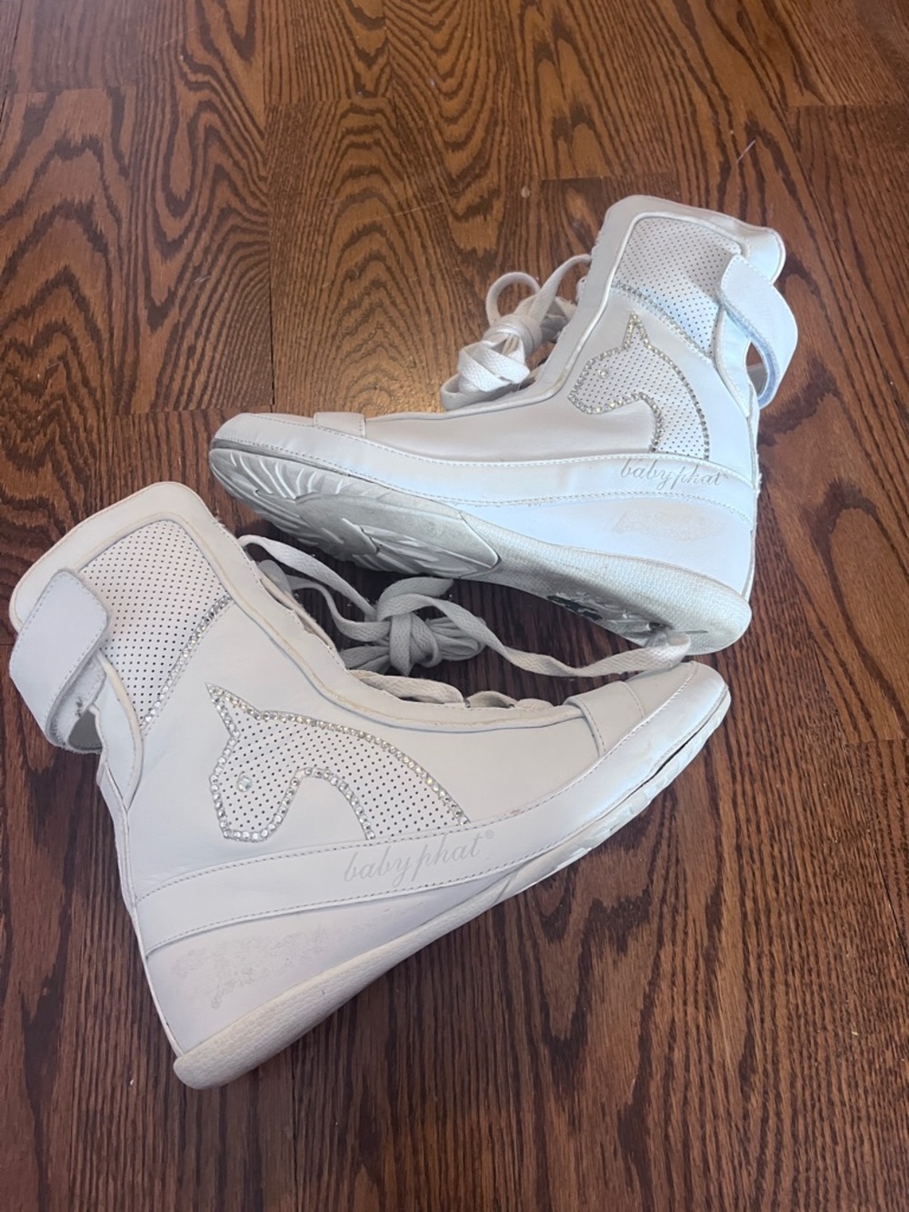 Y2K Baby Phat white high top
Shoes 2000s Baby Phat size 6